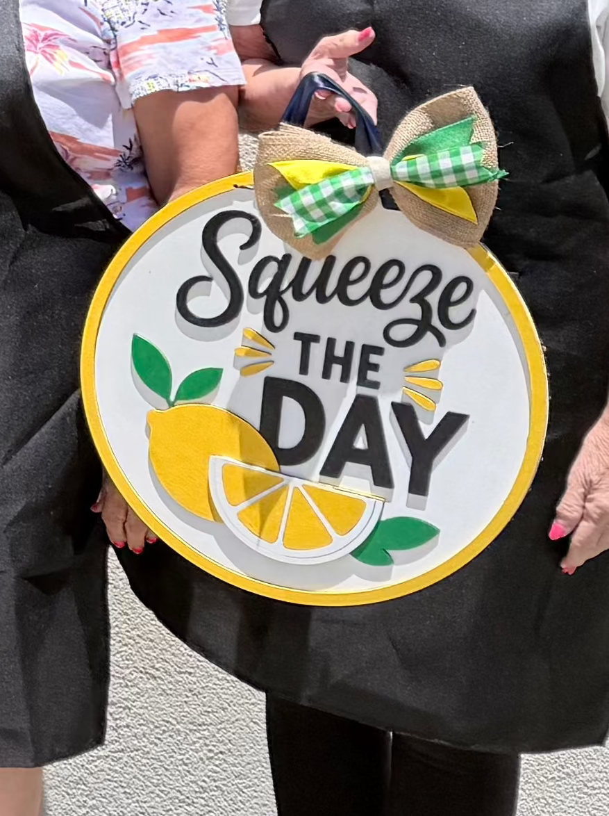 squeeze the day sign