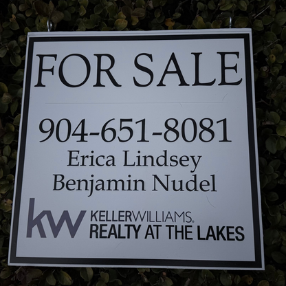 For sale sign with contact information and Keller Williams logo on a dark background