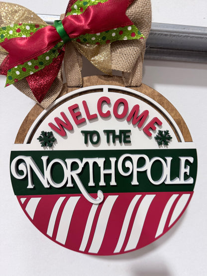Welcome to the north pole door decor door hanger workshop
